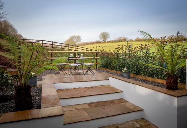Your raised patio area has beautiful views over the rolling Devon countryside. 