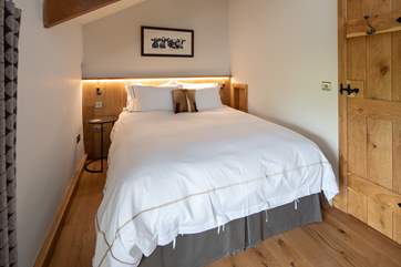 This glorious king-size bed also splits into two twin beds on request.