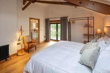Bedroom 1 is simply stunning and is home to this magnificent super-king bed.