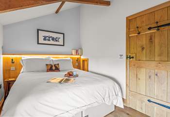 This glorious king-size bed also splits into two twin beds on request.