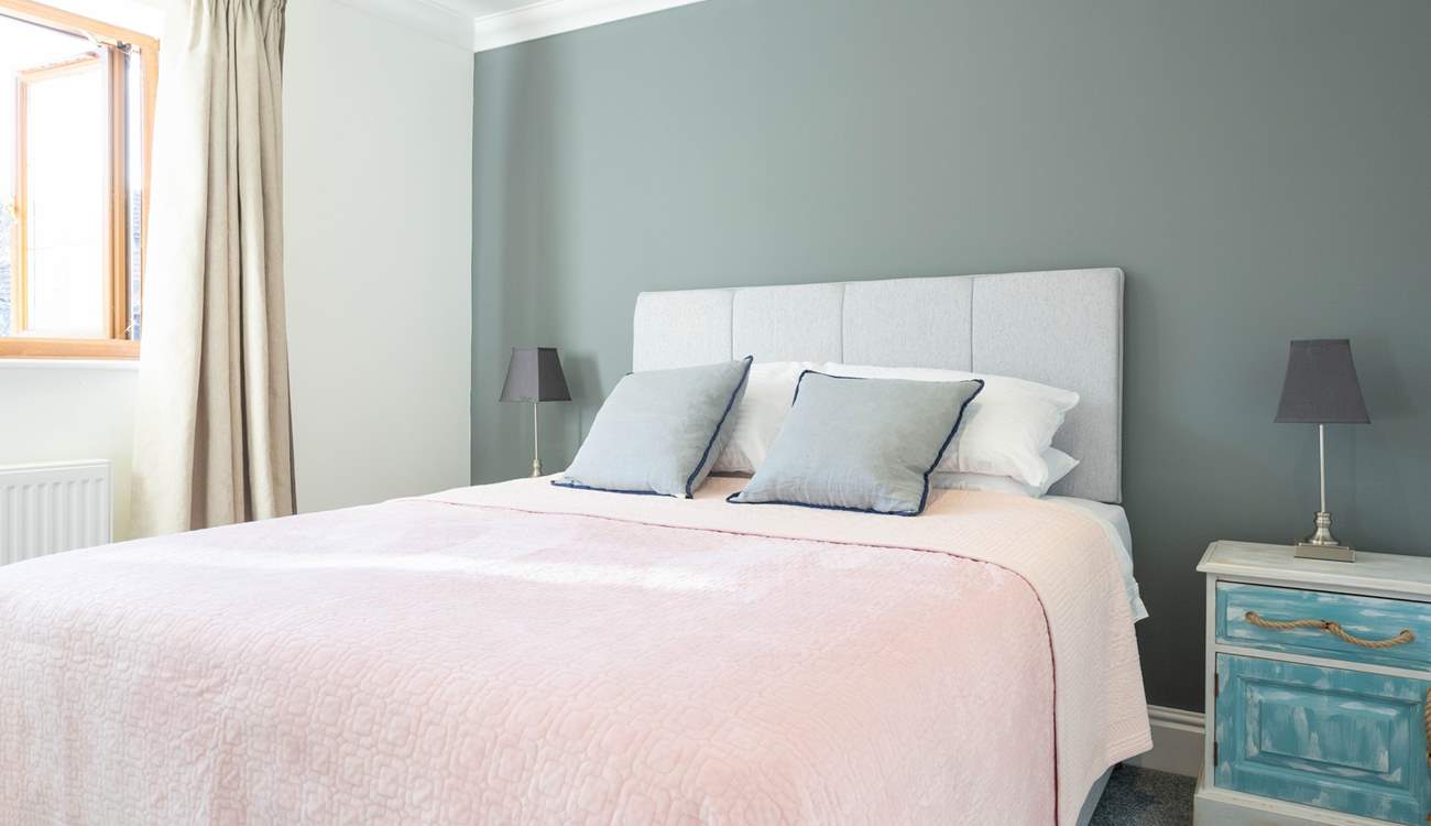 The second bedroom on the second floor overlooks the garden...