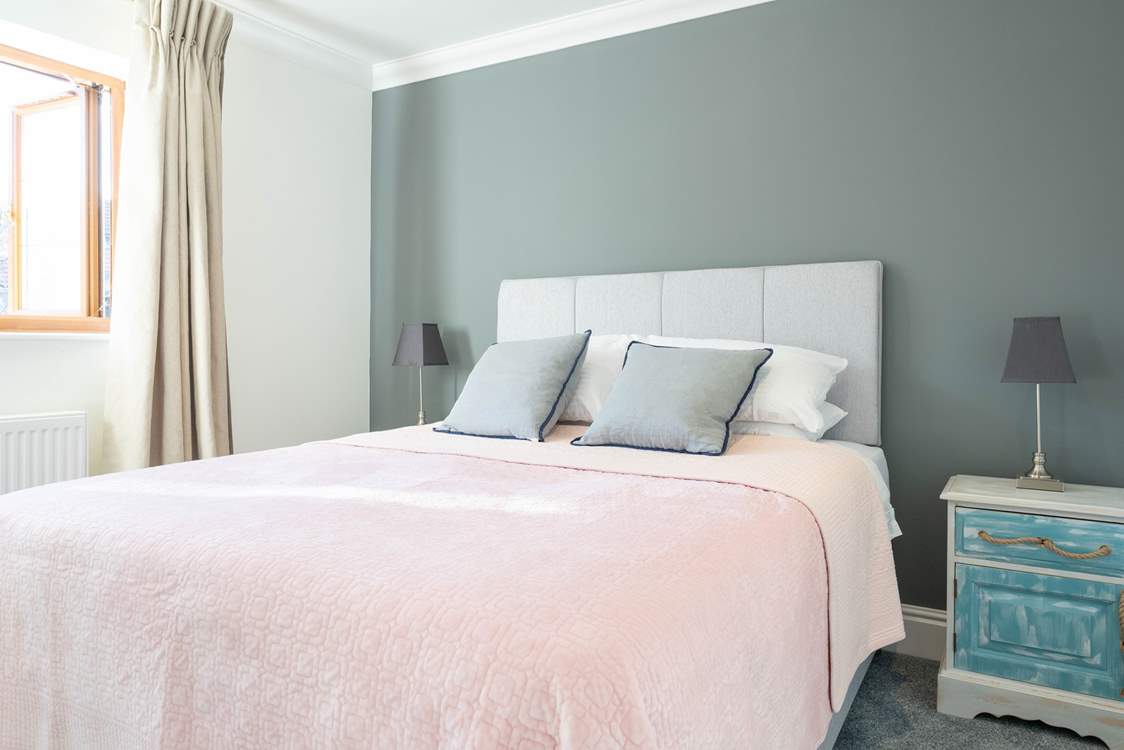 The second bedroom on the second floor overlooks the garden...