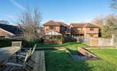 Saye House provides a large garden with a decked-area for outdoor dining. Please note the conservatory now has white trims. - Thumbnail Image