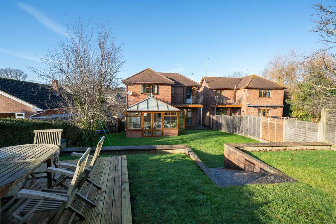 Saye House provides a large garden with a decked-area for outdoor dining. Please note the extension now has white trims.
