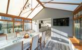 The spacious kitchen/diner, overlooking the garden, is a real sun-trap. Please note the conservatory now has white trims. - Thumbnail Image