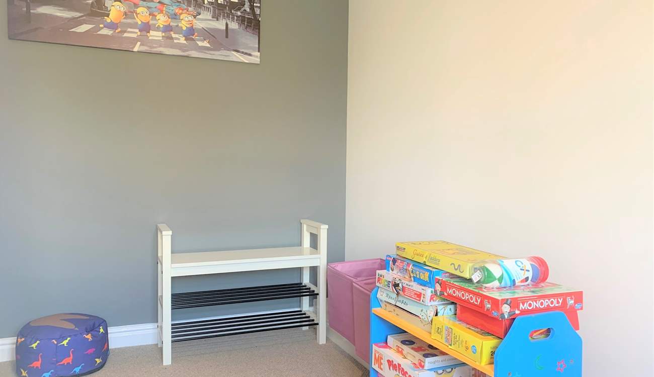 The play-room on the ground floor. Please note, from May 2025 there are now bunk-beds in this room.