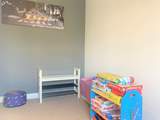 The play-room on the ground floor. Please note, from May 2025 there are now bunk-beds in this room.