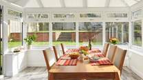 Gather round the dining-room table and enjoy lingering lunches or sunny suppers washed down with a crisp glass of fizz.
