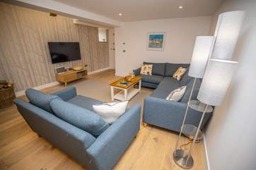 The sitting-area is a great space to enjoy a family film or just have a catch up over a bottle of wine.