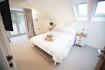 Bedroom 3 has a small verandah which looks out towards your private garden.