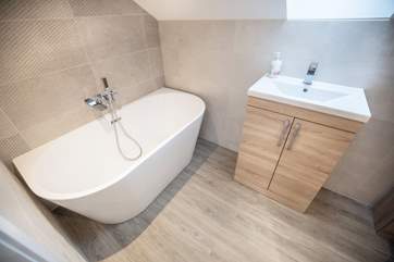 The en suite to Bedroom 3. A wonderful place to soak after a day of adventures.