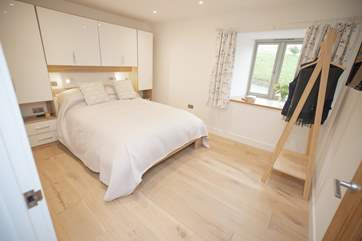 Bedroom 1 is situated downstairs and is ideal for those with limited mobility. The accessible wet-room is next door to this bedroom.