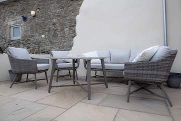 The outside area by the front ddor offers the perfect spot to enjoy the morning sun.