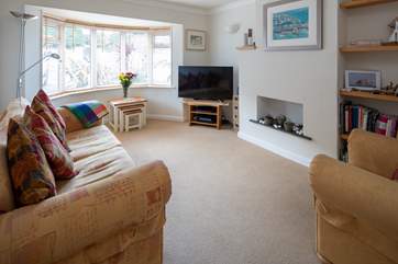 The comfy sitting-room. ***Please note, a new sofa suite will be available for 2021***