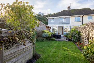 The fully enclosed garden area is great for children and dogs alike.