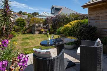 The fully enclosed garden area is great for children and dogs alike.