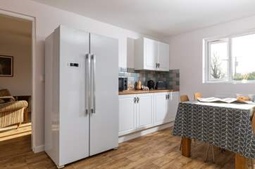 There is everything you might need in the well-equipped kitchen.