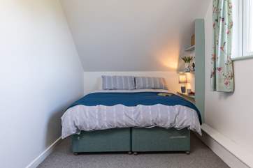 This bedroom can be set up as a king-size bed or twin beds.