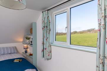 Green fields are just outside your bedroom window.