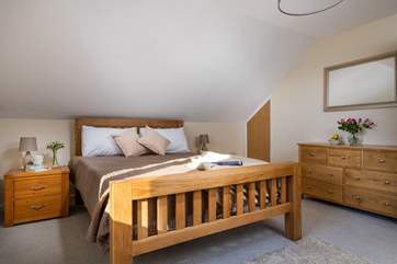 The main bedroom is lovely and light.