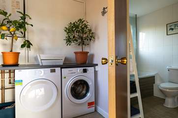 The utility-room leads to the family bathroom - this is perfect for beach towels and muddy boots.