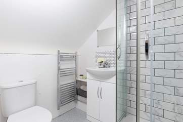 The main bedroom has a fabulous en-suite shower room.
