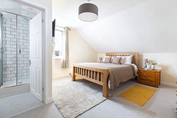 The main bedroom has an en-suite shower room.