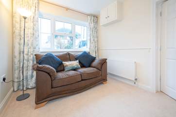 The snug on the ground floor is ideal for the younger ones to escape to and be in charge of their own TV!
