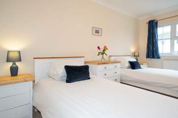 Settle down in the fourth bedroom with twin beds on the first floor.