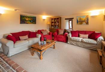 The sitting-room is extremely spacious. The perfect room to sit back and relax as a family.