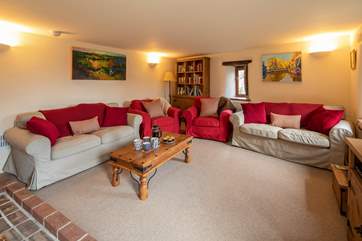 The sitting-room is extremely spacious. The perfect room to sit back and relax as a family.