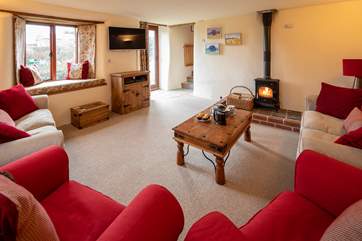 The glowing wood-burner makes this so cosy.