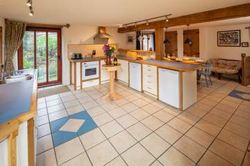 There is plenty of space in the kitchen and dining area. This door leads into the enclosed garden.
