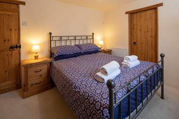 Bedroom 3 is home to this beautiful king-size bed.