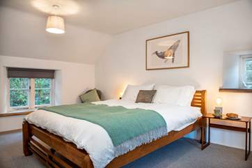 The cottage has two pretty bedrooms.