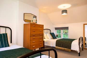The twin bedroom is dual-aspect.