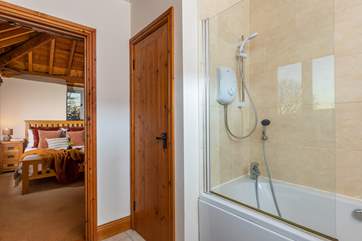 The en suite bathroom to bedroom one.