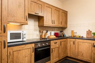 The kitchen is fully equipped ready for a roast diiner or a quick buffet lunch.