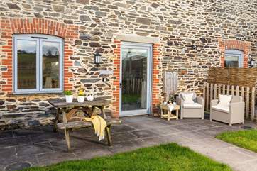 The garden at Kingfisher offers the perfect spot for a morning coffee or a barbecue at the end of the day.