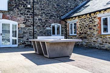 Communal table tennis can be enjoyed in the central courtyard area.
