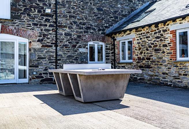 Communal table tennis can be enjoyed in the central courtyard area.