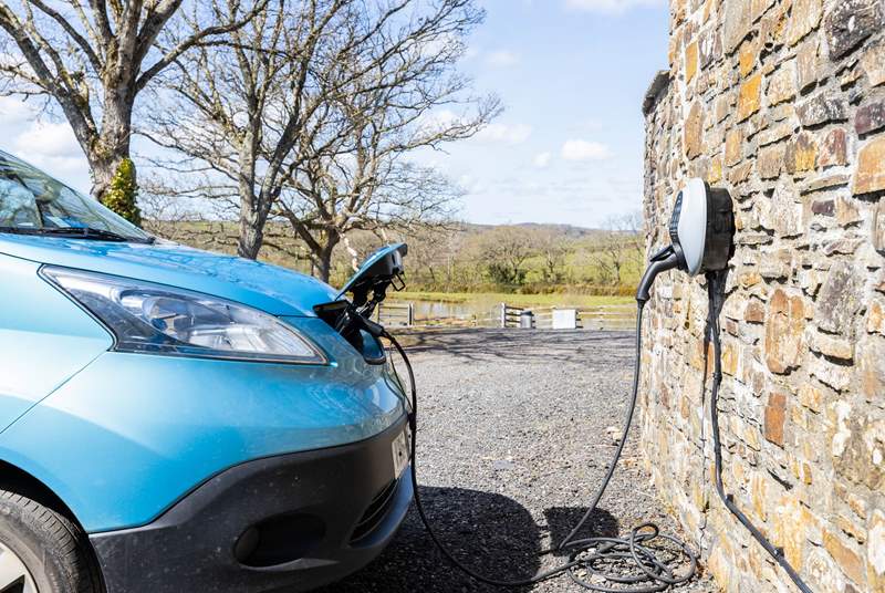 There are two communal electric charging points which you are welcome to use, charged at cost.