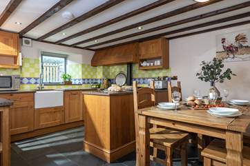 The kitchen and dining area is the perfect place to come together and enjoy a meal at the end of the day.