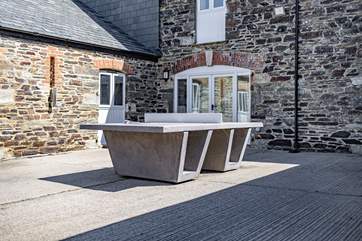 There is a communal table tennis that can be found in the central courtyard.