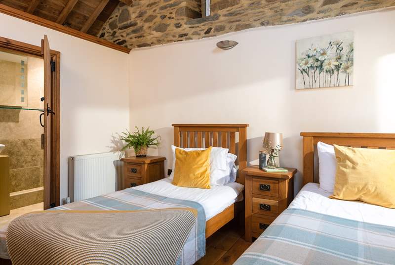 The twin room offers an en suite shower-room, vaulted ceilings and the perfect place to recharge and unwind.