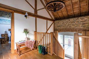 From the top courtyard you enter the barn on the first floor with both bedrooms off to each side.