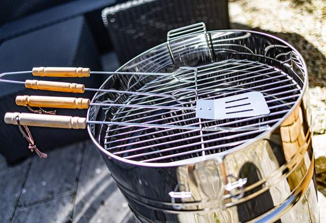 Tasty al fresco suppers can be enjoyed courtesy of the barbecue.