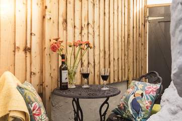 The sweet outside area is bijou, but there's enough room for a bistro table and chairs.