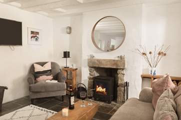 The gorgeous sofa is a lovely spot to snuggle up on.