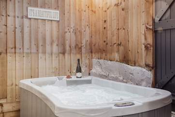 The wonderful hydro pool is perfect for soaking in after a day walking the local coast paths.
